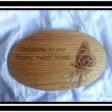 “Welcome to our Home sweet home.” Sign