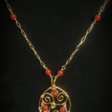 Brass & Red Jade Triskele Necklace